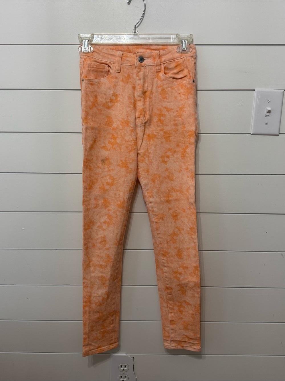 Orange tie dye jeans